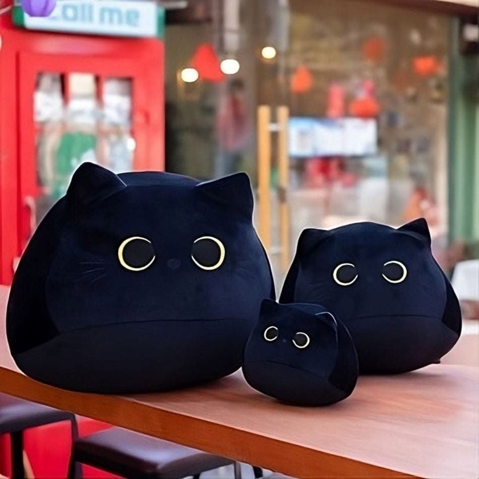 La Peluche Peluche chaton noir aux grands yeux