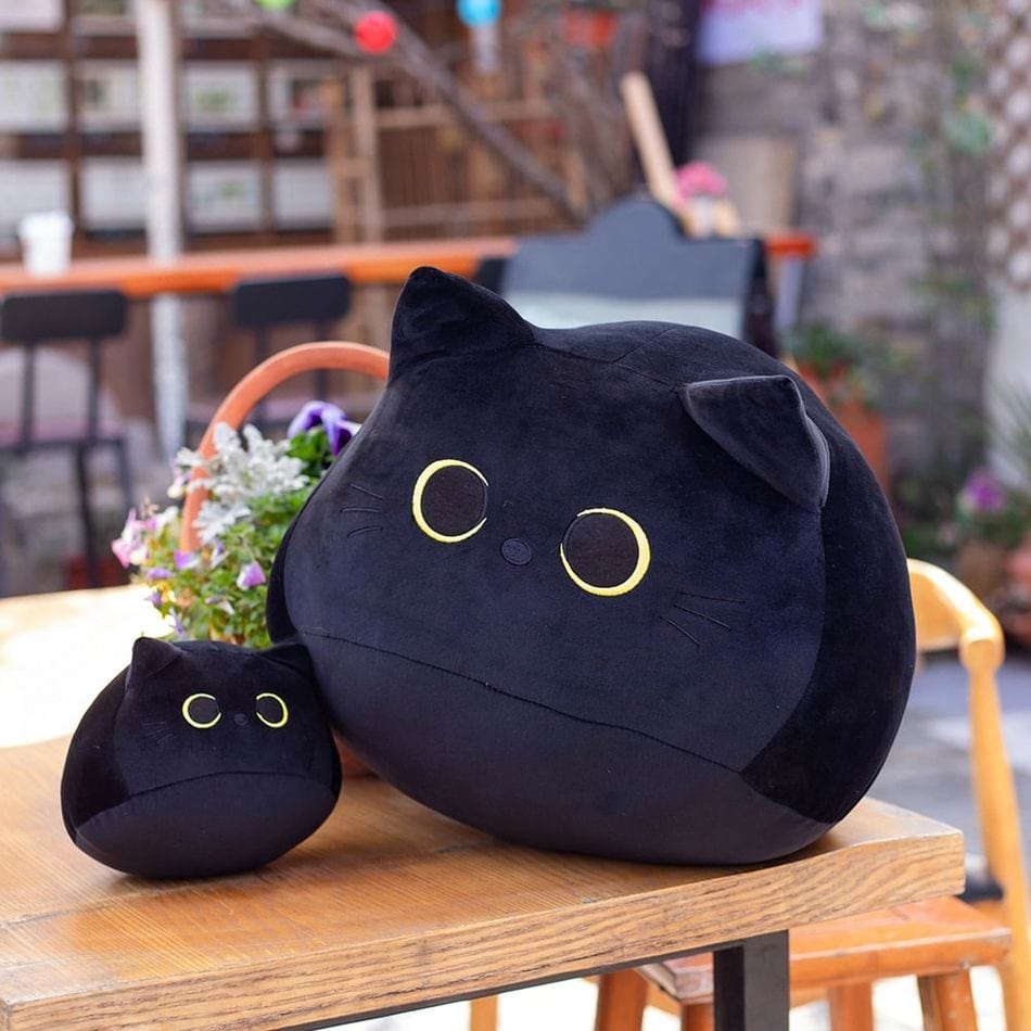 La Peluche Peluche chaton noir aux grands yeux