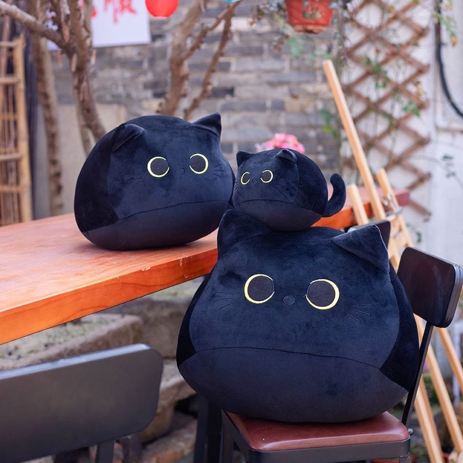 La Peluche Peluche chaton noir aux grands yeux