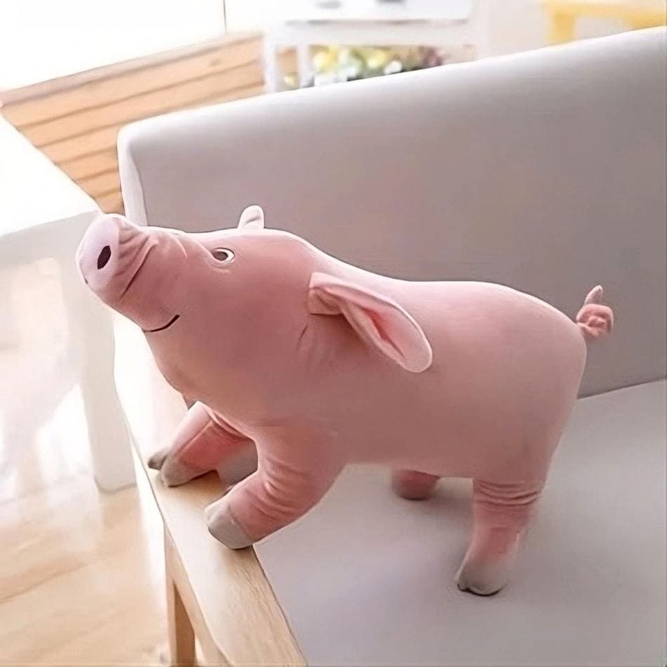 La Peluche Peluche cochon sourire