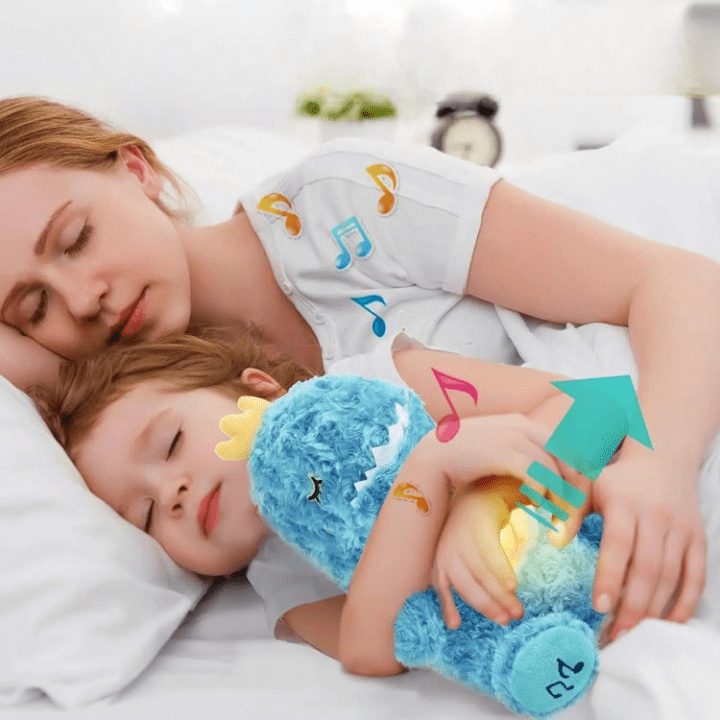 La Peluche Peluche dinosaure adorable respirante avec berceuse