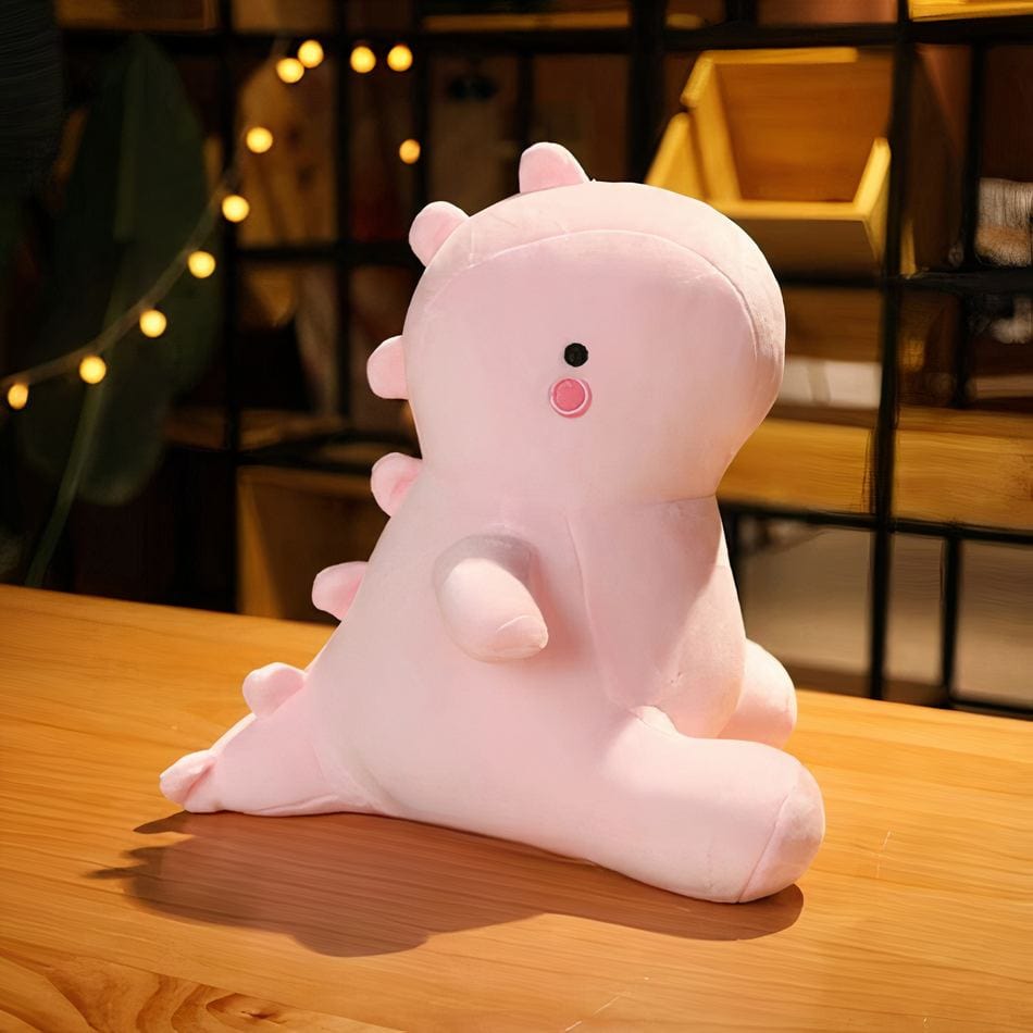 La Peluche Peluche dinosaure adorable rose