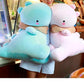 La Peluche Peluche dinosaure adorable rose