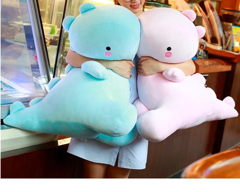 La Peluche Peluche dinosaure adorable rose