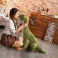 La Peluche Peluche dinosaure vert