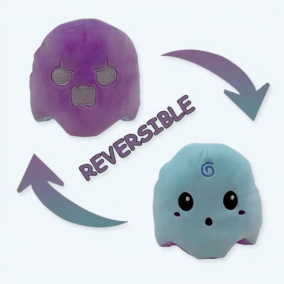 La Peluche Peluche fantôme réversible fluorescente violet et bleu