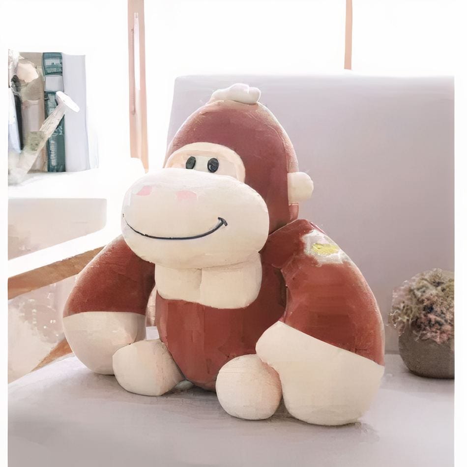 La Peluche Peluche gorille marron heureux