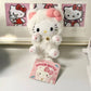 La Peluche Peluche Hello Kitty avec déguisement