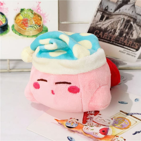 La Peluche Peluche Kirby avec bonnet de nuit bleu