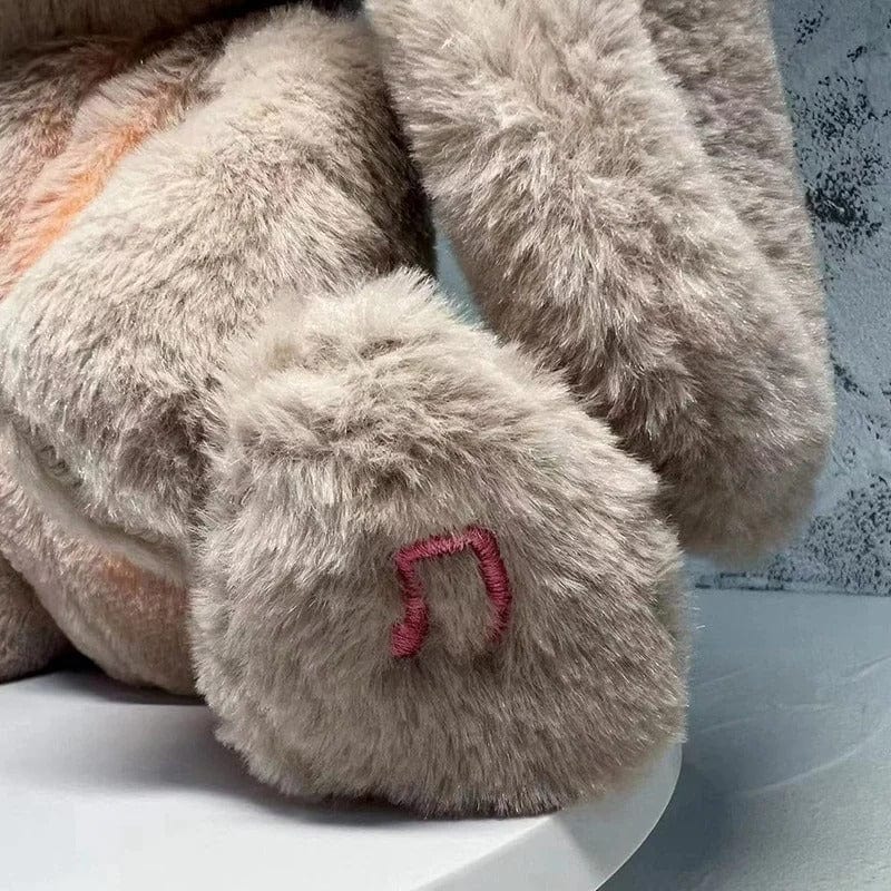 La Peluche Peluche lapin respirante avec berceuse relaxante