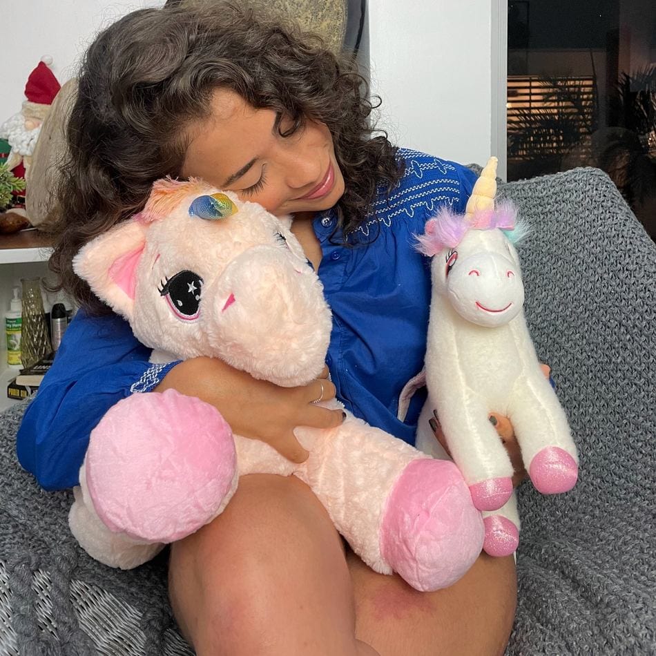 La Peluche Peluche licorne blanche craquante