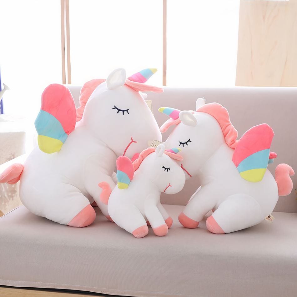 La Peluche Peluche licorne blanche en arc-en-ciel