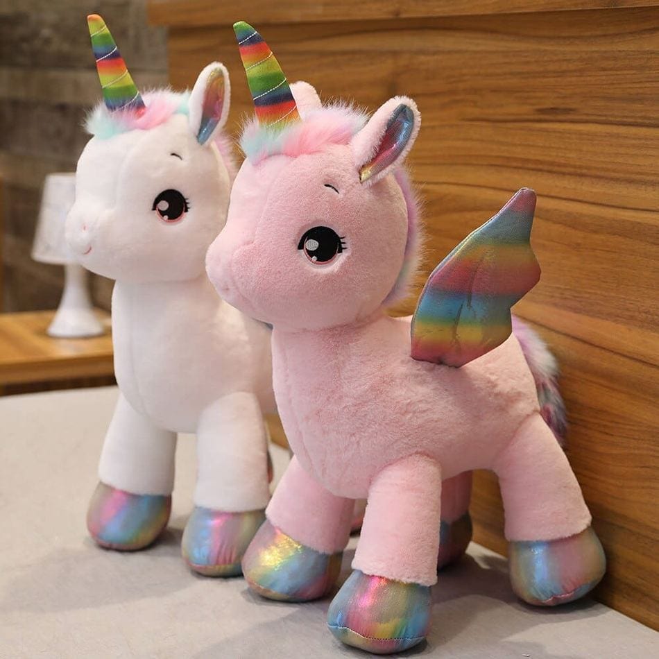 La Peluche Peluche licorne colorée en arc-en-ciel