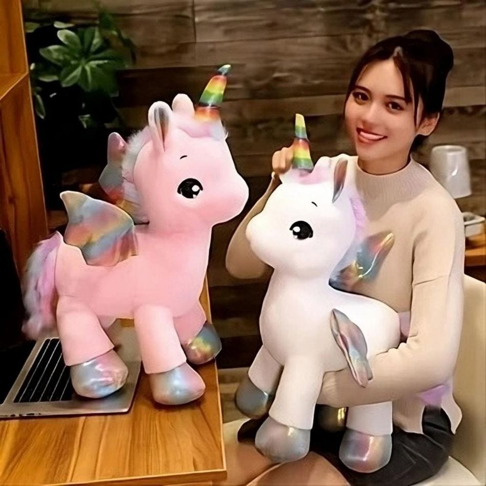 La Peluche Peluche licorne colorée en arc-en-ciel