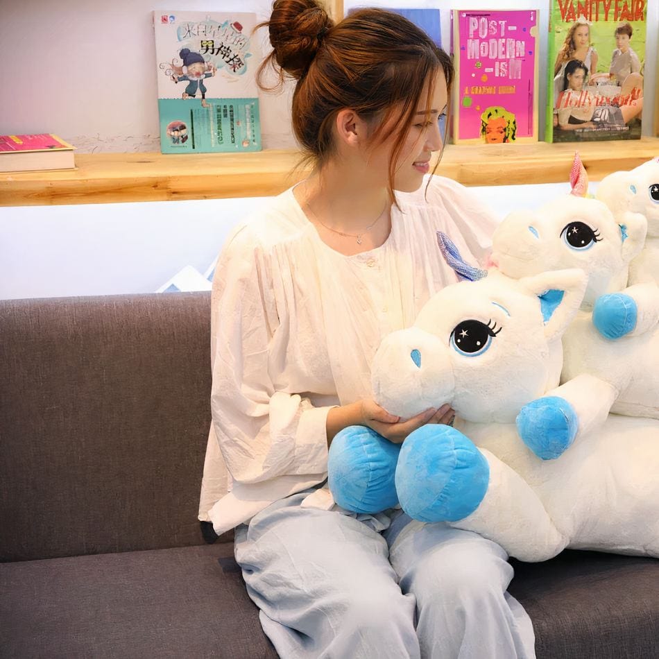 La Peluche Peluche licorne en arc-en-ciel