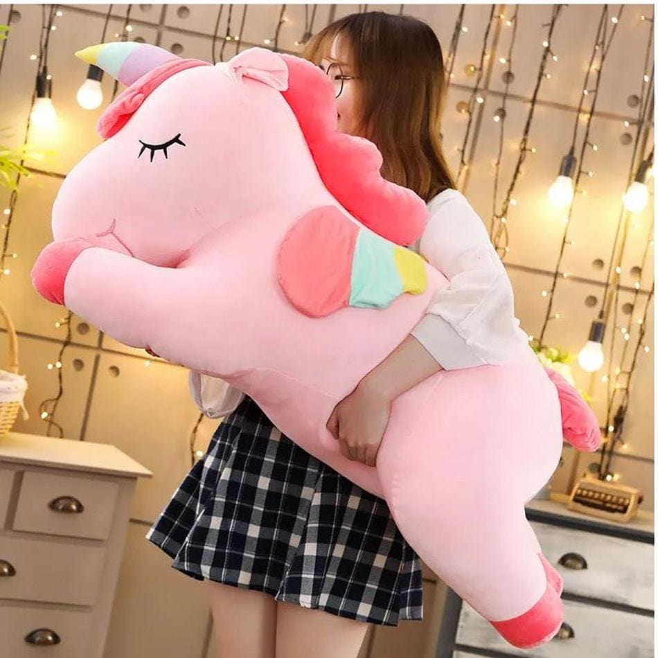La Peluche Peluche licorne rose couchée