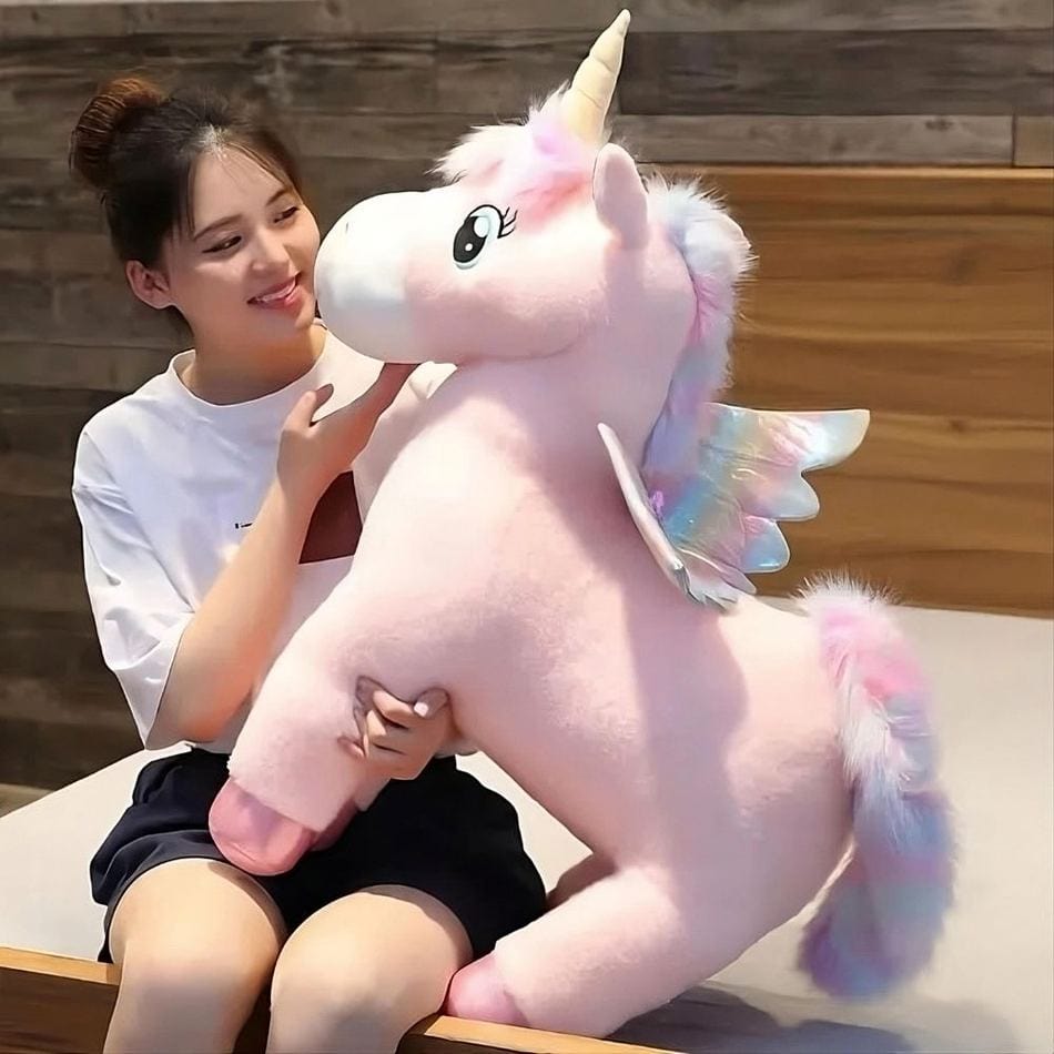 La Peluche Peluche licorne rose craquante