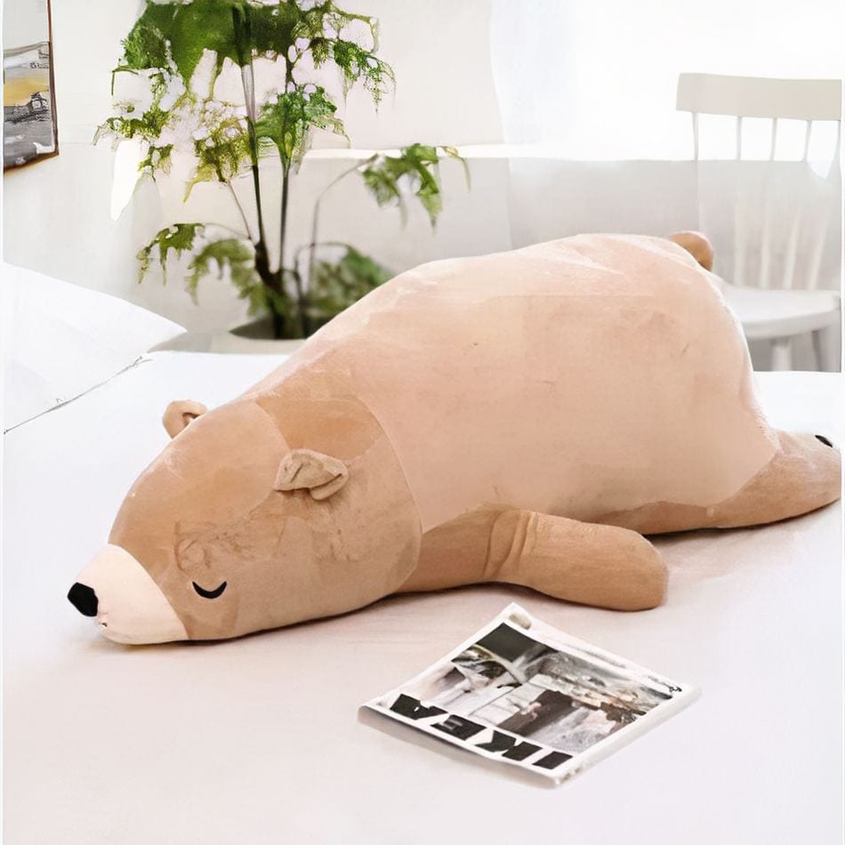 La Peluche Peluche ours marron dormant
