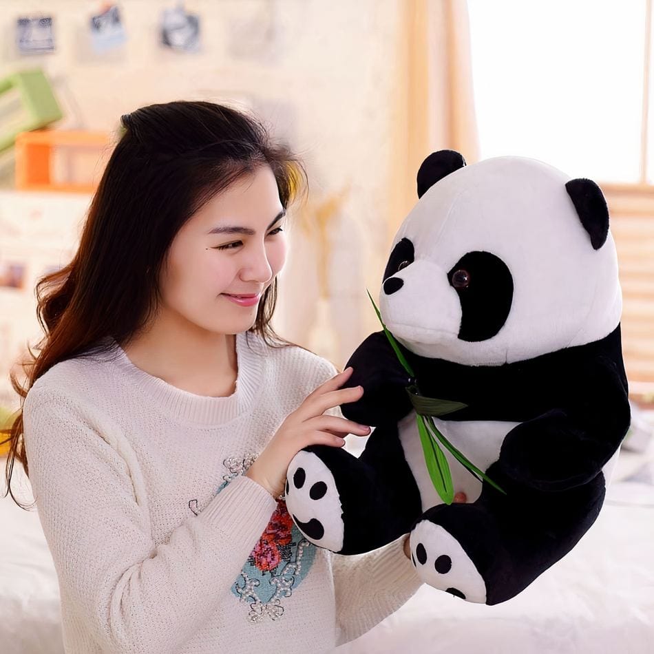 La Peluche Peluche panda avec feuilles
