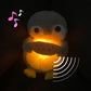 La Peluche Peluche pingouin respirante avec berceuses