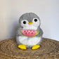 La Peluche Peluche pingouin respirante avec berceuses