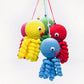 La Peluche Peluche poulpe jaune tricot