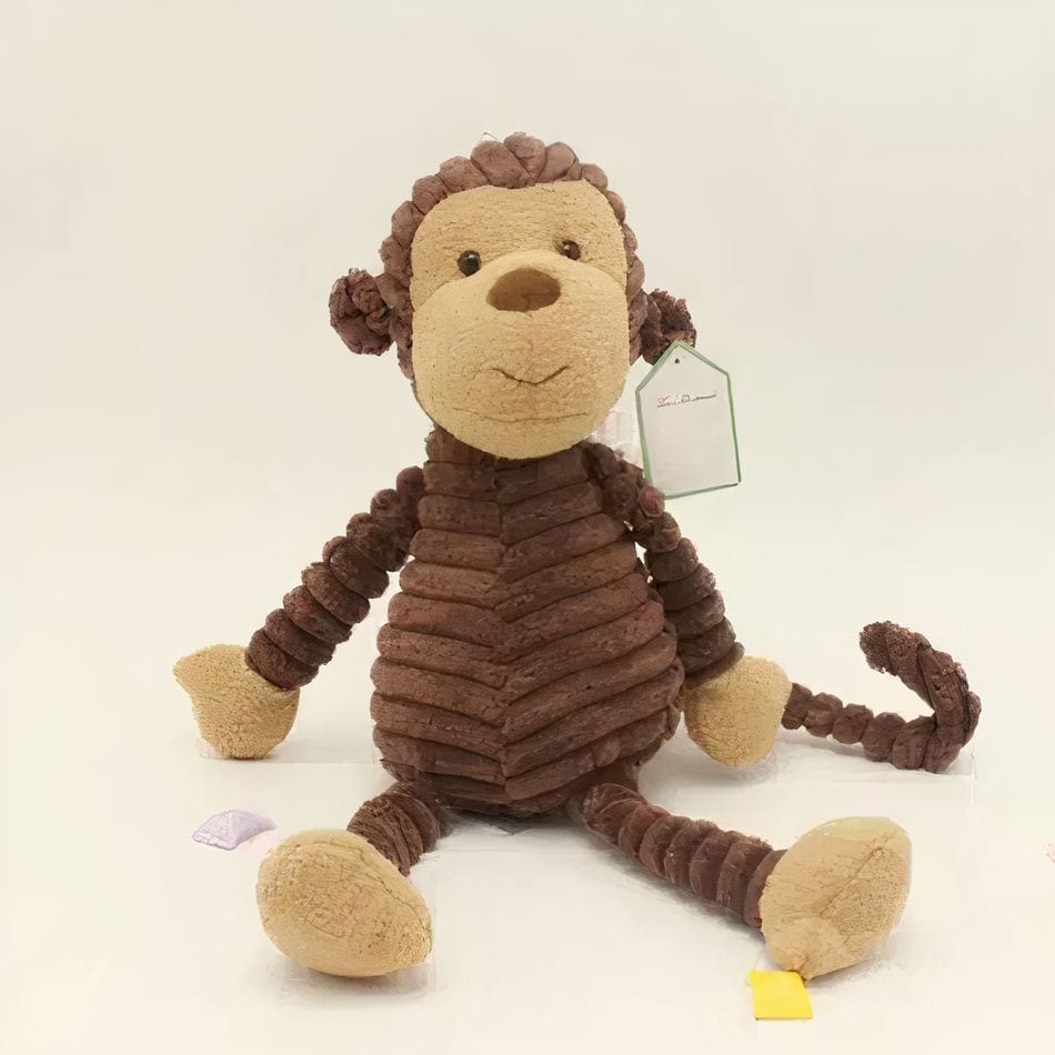 La Peluche Peluche singe adorable