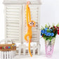 La Peluche Peluche singe kawaii jaune