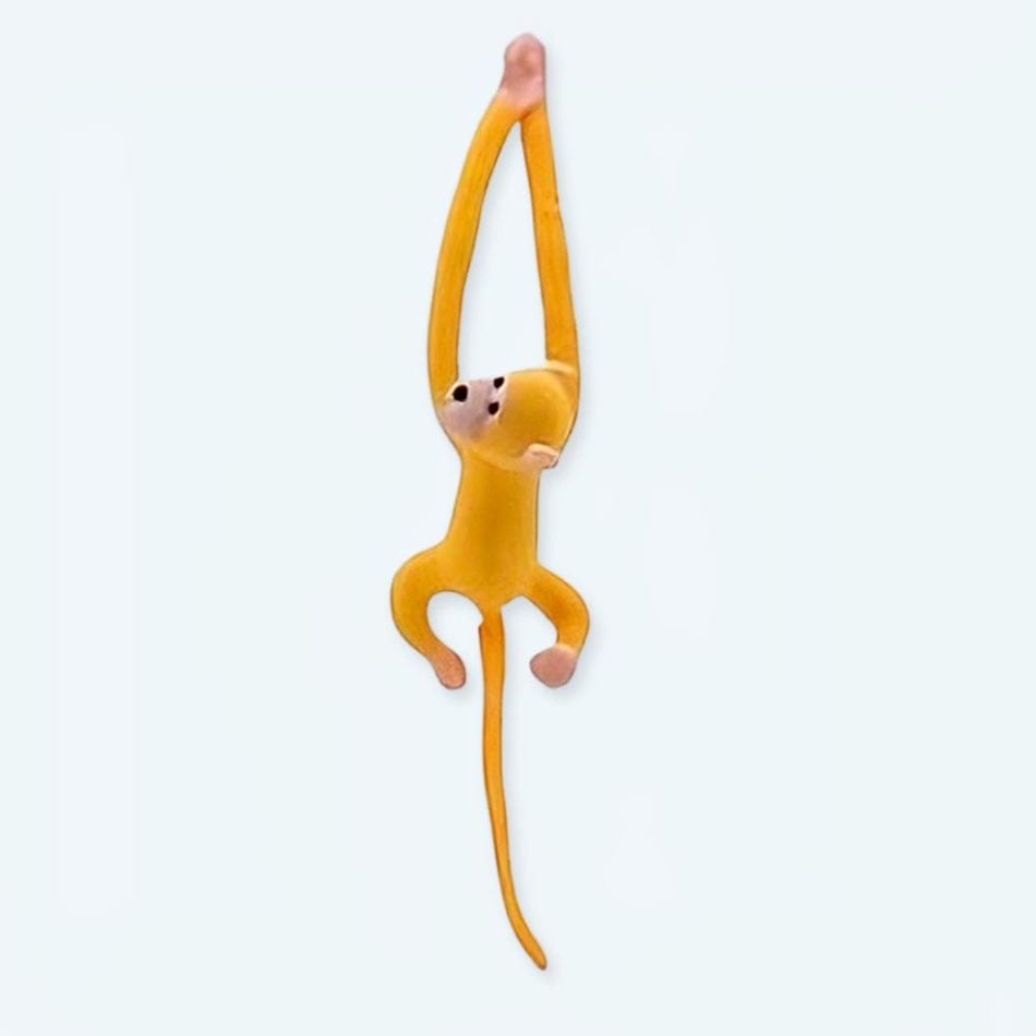 La Peluche Peluche singe kawaii jaune