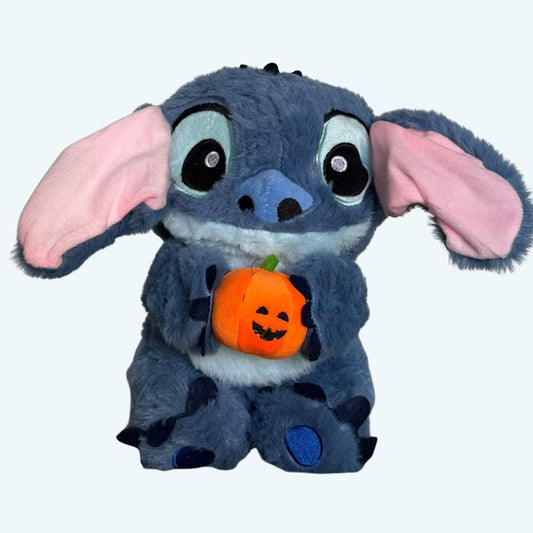 La Peluche Peluche Stitch avec une citrouille respirante