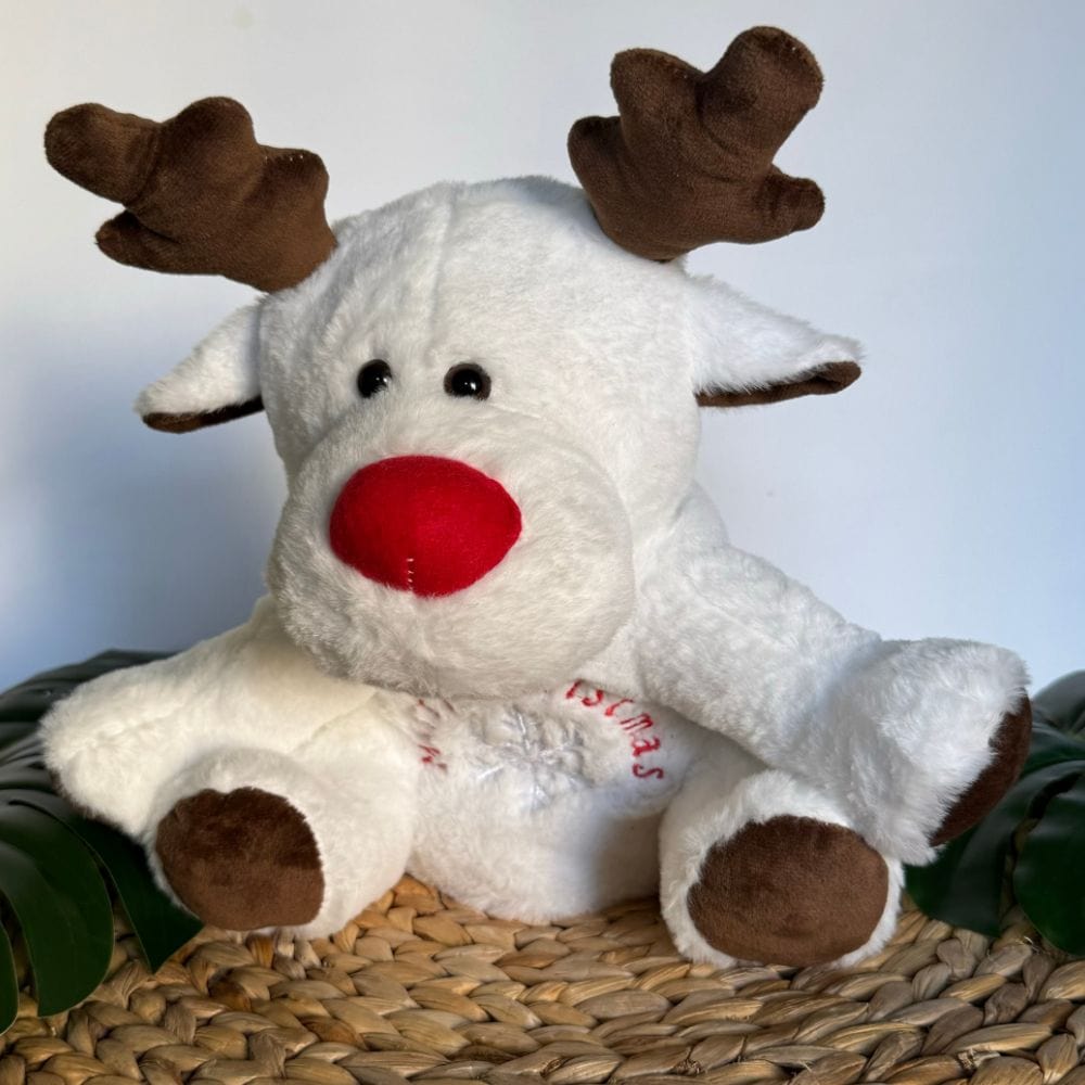 La Peluche Peluche veilleuse renne de Noël respirante avec berceuses