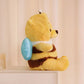 La Peluche Peluche Winnie l’ourson en abeille